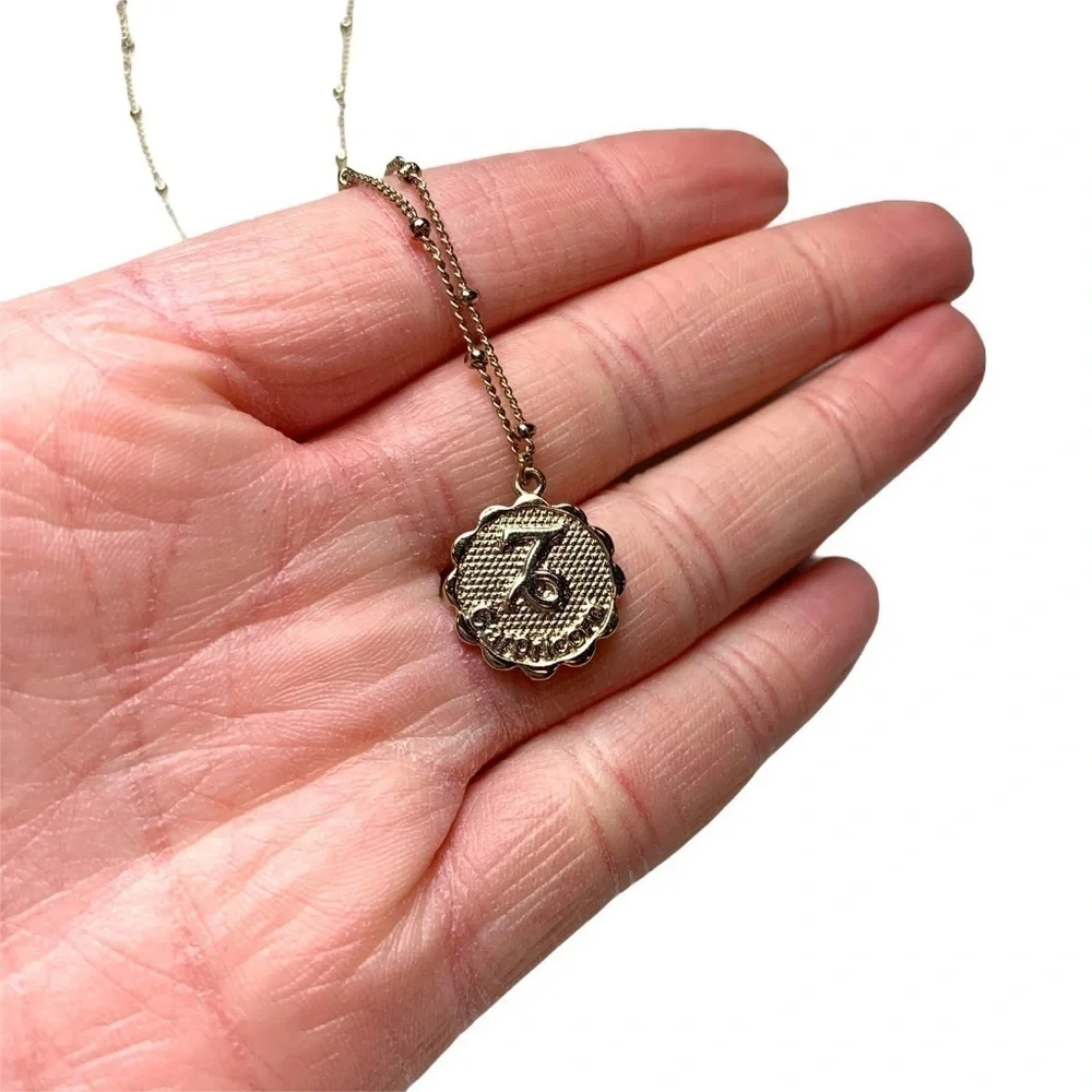 Gold Tone Capricorn Zodiac Short Length Necklace